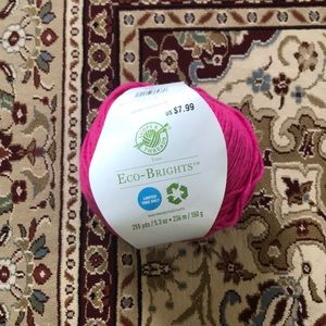 5.3 oz skeins yarn in the color magenta